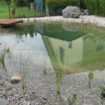 Garten- und Landschaftsbau Peter Oskar in Reithofen - Garten Teich Wasser Ruhezone Kies Steg