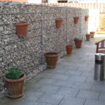 Garten- und Landschaftsbau Peter Oskar in Reithofen - Garten Sichtschutz Nachbar Stein Schallschutz